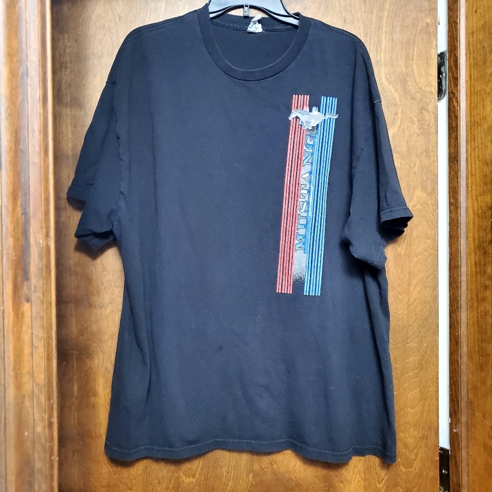 Vintage Mustang burnout shirt is featuring Ford Mustang Pony Tribar Logo Delta